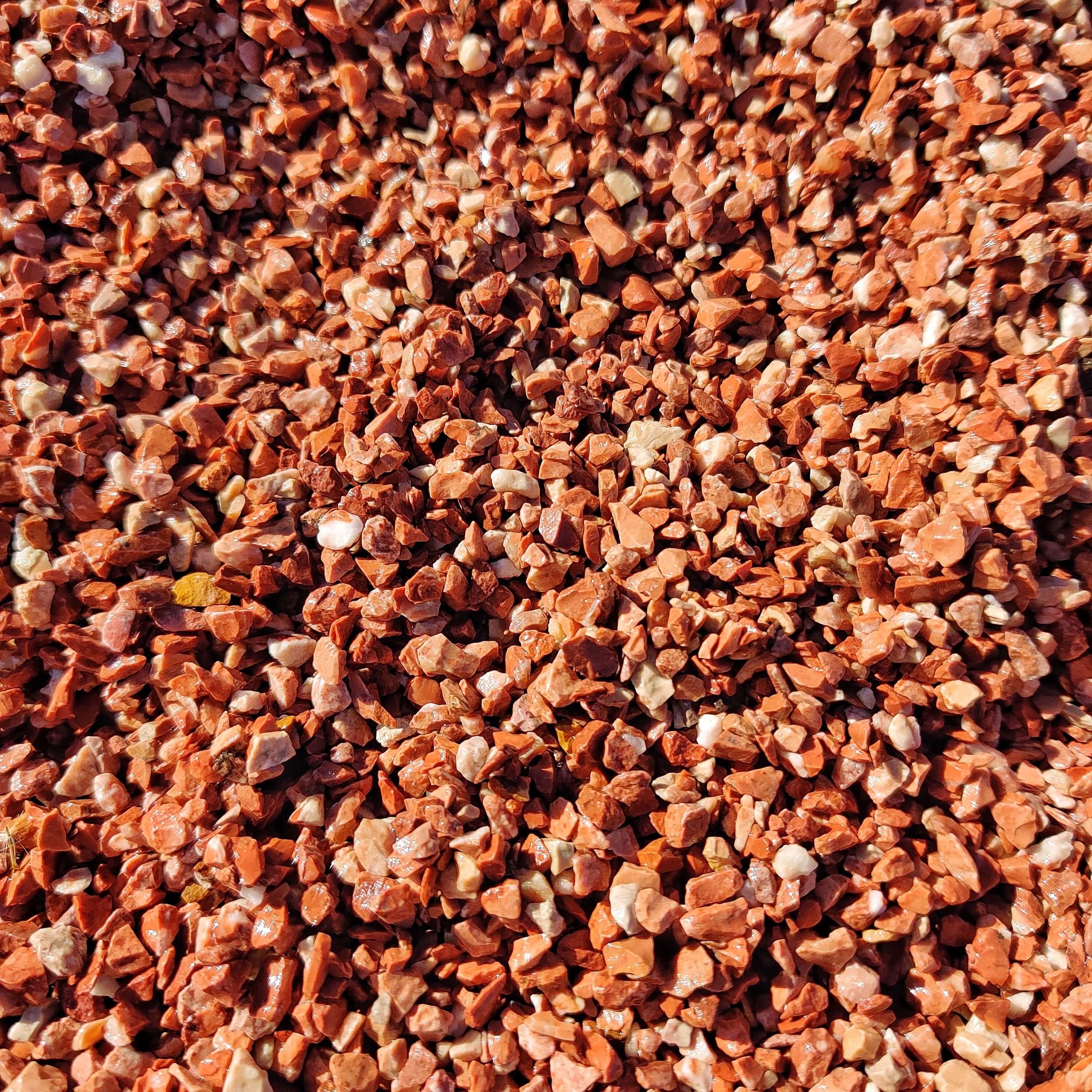 piedra triturada color rojo fuego